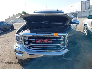 2018 GMC Sierra 1500 SLT with VIN 3GTP1NEC2JG528387, listed as a IAAI auction lot 42598955 with Not provided miles and . Bid and sale history available at DreamBid. Image 12.