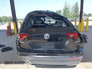 2021 Volkswagen Tiguan S with VIN 3VV0B7AX1MM098300, listed as a IAAI auction lot 42574636 with 53,559 mi miles and . Bid and sale history available at DreamBid. Image 16.