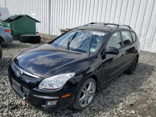 2012 Hyundai Elantra Touring SE with VIN KMHDC8AE0CU137417, listed as a Copart auction lot 47947295 with 141,259 mi miles and Salvage Title. Bid and sale history available at carsss.com. Image 1.