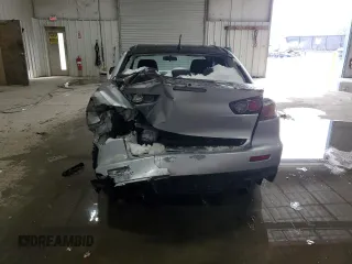 2014 Mitsubishi Lancer Evolution MR with VIN JA32W5FV6EU000610, listed as a Copart auction lot 43634925 with 62,301 mi miles and Salvage Title. Bid and sale history available at carsss.com. Image 6.
