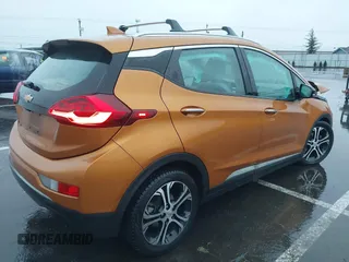 2017 Chevrolet Bolt EV Premier with VIN 1G1FX6S02H4131210, listed as a IAAI auction lot 41238714 with 97,613 mi miles and . Bid and sale history available at DreamBid. Image 4.