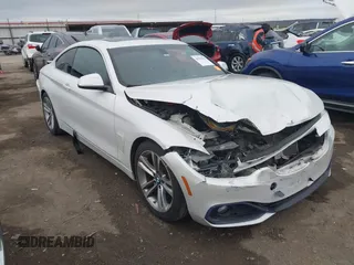 2016 BMW 4 Series 428i with VIN WBA3N7C54GK227475, listed as a IAAI auction lot 40963425 with 87,408 mi miles and . Bid and sale history available at carsss.com. Image 1.