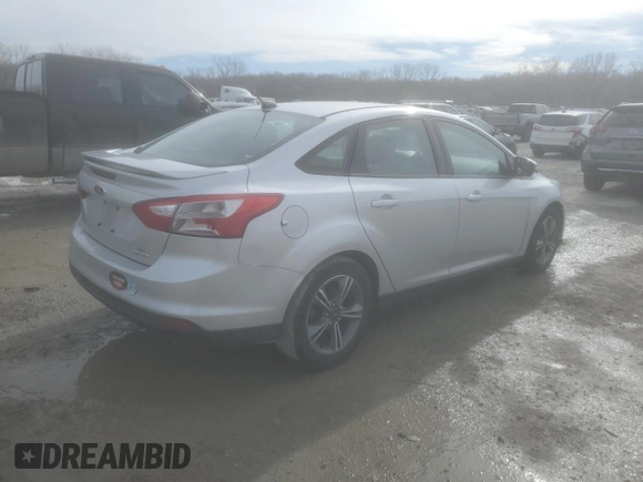 2014 Ford Focus SE with VIN 1FADP3F24EL264003, listed as a Copart auction lot 43800485 with 138,390 mi miles and Salvage Title. Bid and sale history available at DreamBid. Image 3.