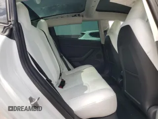 2023 Tesla Model 3 with VIN 5YJ3E1EA8PF499535, listed as a Copart auction lot 59974115 with 18,365 mi miles and Salvage title. Bid and sale history available at DreamBid. Image 10.