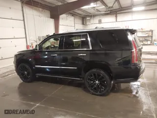 2015 Cadillac Escalade Platinum with VIN 1GYS4PKJ9FR745825, listed as a IAAI auction lot 41201715 with 133,363 mi miles. Bid and sale history available at carsss.com. Image 15.
