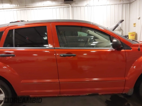 2008 Dodge Caliber SE with VIN 1B3HB28B48D634707, listed as a IAAI auction lot 41636023 with 149,652 mi miles and . Bid and sale history available at carsss.com. Image 14.