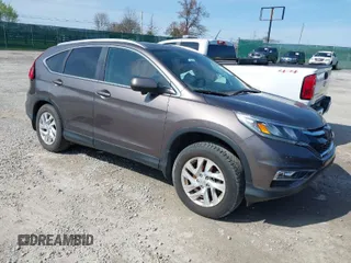 2015 Honda CR-V EX-L with VIN 2HKRM4H7XFH671210, listed as a IAAI auction lot 41860158 with 36,000 mi miles. Bid and sale history available at carsss.com. Image 1.