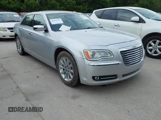 2012 Chrysler 300 Limited with VIN 2C3CCACG9CH223032, listed as a IAAI auction lot 42144147 with 139,625 mi miles. Bid and sale history available at carsss.com. Image 1.