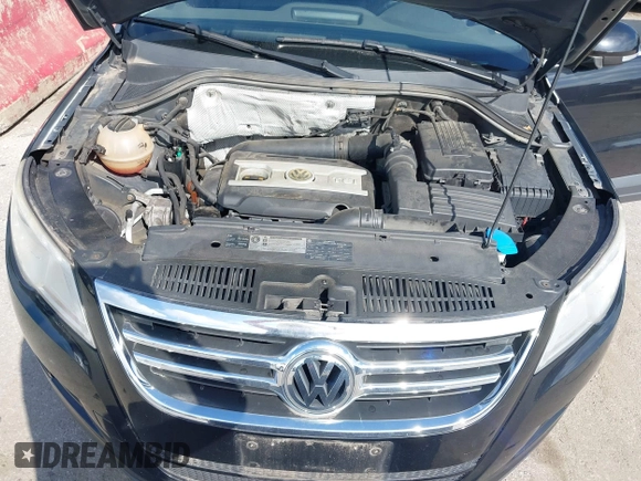 2010 Volkswagen Tiguan with VIN WVGAV9AX4AW513705, listed as a IAAI auction lot 42756432 with 212,980 mi miles and . Bid and sale history available at DreamBid. Image 10.