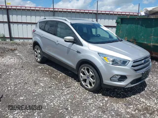 2017 Ford Escape Titanium with VIN 1FMCU0J99HUB23567, listed as a IAAI auction lot 42127795 with 93,056 mi miles. Bid and sale history available at carsss.com. Image 1.