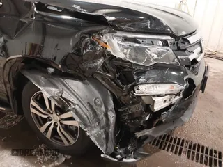 2018 Honda Pilot EX-L z VIN 5FNYF6H82JB014516, wystawiony jako IAAI lot #41615682 z przebiegiem 87 067 mil mil oraz . Historia ofert i sprzedaży dostępna na DreamBid. Obrazek 18.