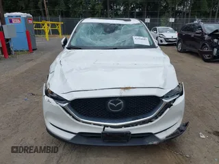 2018 Mazda CX-5 Grand Touring with VIN JM3KFBDM1J0382306, listed as a IAAI auction lot 42554947 with 121,303 mi miles and . Bid and sale history available at DreamBid. Image 12.