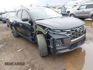 2022 Hyundai Santa Cruz Limited z VIN 5NTJEDAF9NH008643, wystawiony jako IAAI lot #41869567 z przebiegiem 49 297 mil mil oraz . Historia ofert i sprzedaży dostępna na DreamBid. Obrazek 1.