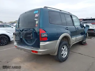 2002 Mitsubishi Montero LTD with VIN JA4MW51RX2J040586, listed as a IAAI auction lot 41566077 with 149,851 mi miles. Bid and sale history available at carsss.com. Image 4.