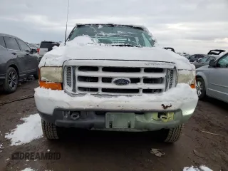 2000 Ford Super Duty F-250 XL with VIN 1FTNW21SXYEB02887, listed as a Copart auction lot 79716124 with 184,020 mi miles and Salvage Title. Bid and sale history available at carsss.com. Image 5.