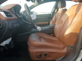 2018 Maserati Ghibli with VIN ZAM57XSA0J1286682, listed as a Copart auction lot 65457315 with 50,169 mi miles and Salvage title. Bid and sale history available at DreamBid. Image 7.