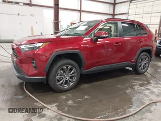 2023 Toyota RAV4 Hybrid XLE Premium with VIN JTMB6RFV4PD116495, listed as a IAAI auction lot 42588604 with 24,258 mi miles and . Bid and sale history available at DreamBid. Image 2.