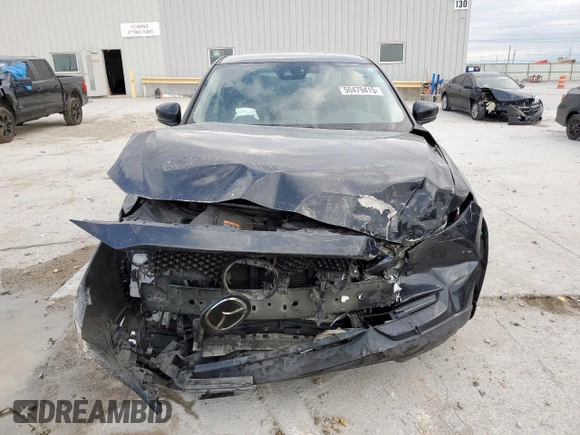 2021 Mazda CX-5 Sport with VIN JM3KFABM7M0325089, listed as a Copart auction lot 50479415 with 137,705 mi miles and Salvage Title. Bid and sale history available at carsss.com. Image 5.