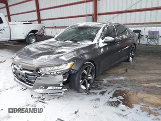 2018 Honda Accord Sedan Sport 1.5T with VIN 1HGCV1F31JA087538, listed as a IAAI auction lot 41479031 with 131,159 mi miles. Bid and sale history available at carsss.com. Image 2.
