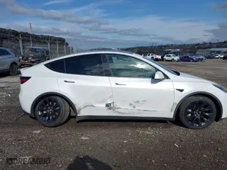 2023 Tesla Model Y Long Range with VIN 7SAYGDEE2PA059668, listed as a IAAI auction lot 41901079 with 58,276 mi miles. Bid and sale history available at carsss.com. Image 6.