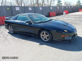 1997 Pontiac Firebird Trans Am with VIN 2G2FV22P7V2215905, listed as a IAAI auction lot 41764996 with 112,368 mi miles. Bid and sale history available at carsss.com. Image 1.