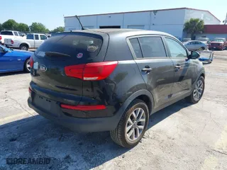 2016 Kia Sportage LX with VIN KNDPB3AC0G7795412, listed as a IAAI auction lot 42053117 with 159,064 mi miles. Bid and sale history available at carsss.com. Image 4.