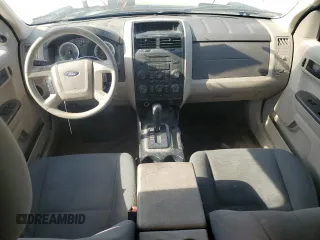 2009 Ford Escape XLS with VIN 1FMCU02719KB53740, listed as a Copart auction lot 55210035 with 144,672 mi miles and Salvage title. Bid and sale history available at DreamBid. Image 8.