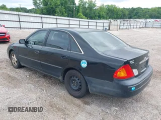 2001 Toyota Avalon XL z VIN 4T1BF28B61U191292, wystawiony jako IAAI lot #42239698 z przebiegiem 288 073 mil mil oraz . Historia ofert i sprzedaży dostępna na DreamBid. Obrazek 3.