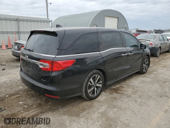 2018 Honda Odyssey Elite with VIN 5FNRL6H92JB024856, listed as a Copart auction lot 52409895 with 123,264 mi miles and Salvage title. Bid and sale history available at DreamBid. Image 3.