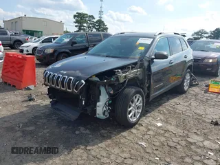 2016 Jeep Cherokee Latitude with VIN 1C4PJLCS1GW257539, listed as a IAAI auction lot 42445331 with 55,879 mi miles and . Bid and sale history available at DreamBid. Image 2.