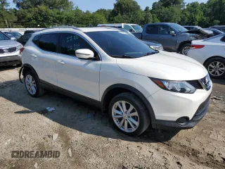 2017 Nissan Rogue Sport S with VIN JN1BJ1CRXHW105095, listed as a Copart auction lot 63677184 with 126,583 mi miles and Salvage Title. Bid and sale history available at carsss.com. Image 4.