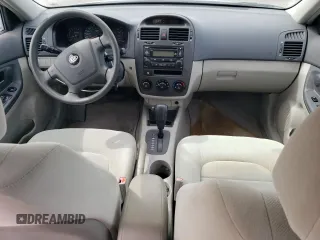 2006 Kia Spectra EX with VIN KNAFE121165250136, listed as a Copart auction lot 67966364 with 105,067 mi miles and Clean Title. Bid and sale history available at carsss.com. Image 8.