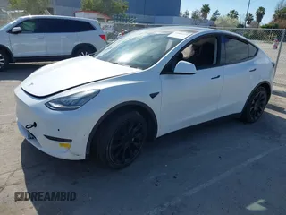 2022 Tesla Model Y Long Range with VIN 7SAYGDEE0NF340822, listed as a IAAI auction lot 41881224 with Not Provided miles and . Bid and sale history available at DreamBid. Image 2.