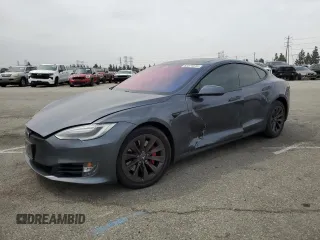 2017 Tesla Model S 100D с VIN 5YJSA1E40HF227256, выставлен на аукционе Copart как лот 62371615 с пробегом 86 232 миль миль и Списание • Salvage title. История ставок и продаж доступна на DreamBid. Изображение 1.