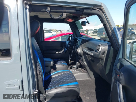 2015 Jeep Wrangler Unlimited Rubicon with VIN 1C4BJWFG7FL525724, listed as a IAAI auction lot 41394059 with 132,058 mi miles. Bid and sale history available at carsss.com. Image 5.