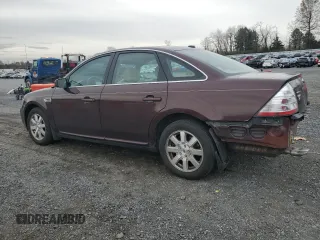 2009 Ford Taurus SE with VIN 1FAHP23W89G125025, listed as a Copart auction lot 80710004 with 114,176 mi miles and Salvage Title. Bid and sale history available at carsss.com. Image 2.