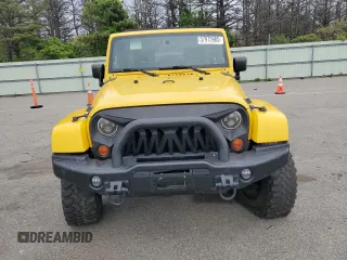 2009 Jeep Wrangler Unlimited Rubicon with VIN 1J8GA69109L761089, listed as a Copart auction lot 57975985 with 195,530 mi miles and Salvage title. Bid and sale history available at DreamBid. Image 5.