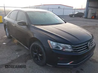 2018 Volkswagen Passat 2.0T S with VIN 1VWAA7A33JC010585, listed as a IAAI auction lot 41855268 with 148,240 mi miles. Bid and sale history available at carsss.com. Image 1.