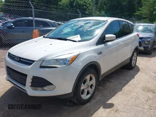 2014 Ford Escape SE with VIN 1FMCU9G94EUB01239, listed as a IAAI auction lot 42628460 with 122,032 mi miles and . Bid and sale history available at DreamBid. Image 2.
