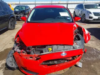 2015 Ford Focus SE z VIN 1FADP3F24FL283927, wystawiony jako IAAI lot #41755250 z przebiegiem Nie podano mil oraz . Historia ofert i sprzedaży dostępna na DreamBid. Obrazek 12.