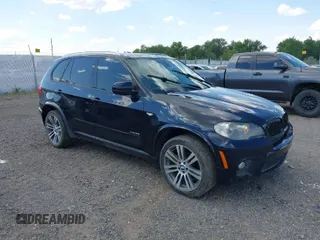 2011 BMW X5 35i with VIN 5UXZV4C53BL743050, listed as a IAAI auction lot 40074369 with 118,970 mi miles. Bid and sale history available at carsss.com. Image 1.