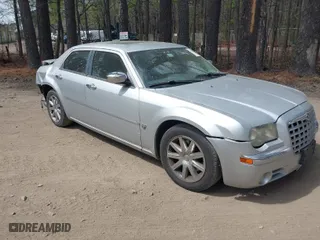 2007 Chrysler 300 C with VIN 2C3KA63H17H896796, listed as a IAAI auction lot 41929716 with 166,803 mi miles. Bid and sale history available at carsss.com. Image 1.