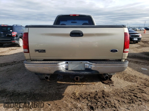 2000 Ford F-150 XL with VIN 1FTRF18L9YKA95457, listed as a Copart auction lot 67083164 with 97,988 mi miles and Salvage title. Bid and sale history available at DreamBid. Image 6.