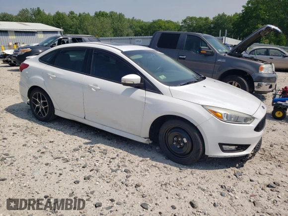 2015 Ford Focus SE with VIN 1FADP3F28FL332899, listed as a Copart auction lot 60055185 with 76,948 mi miles and Clean title. Bid and sale history available at DreamBid. Image 4.