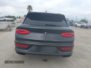 2021 Bentley Bentayga V8 z VIN SJAAM2ZV5MC038171, wystawiony jako IAAI lot #42057762 z przebiegiem 25 973 mil mil oraz . Historia ofert i sprzedaży dostępna na DreamBid. Obrazek 16.