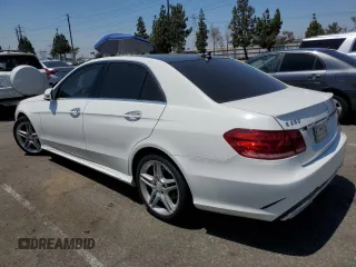 2014 Mercedes-Benz E 350 Sport with VIN WDDHF5KB8EA818290, listed as a Copart auction lot 62786005 with 128,327 mi miles and Salvage title. Bid and sale history available at DreamBid. Image 2.