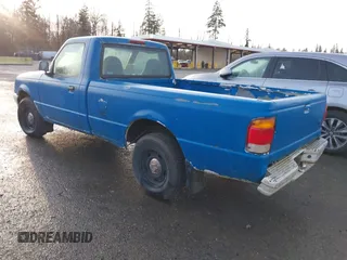 1999 Ford Ranger XL with VIN 1FTYR10V7XPB93324, listed as a IAAI auction lot 41762585 with 214,904 mi miles. Bid and sale history available at carsss.com. Image 3.