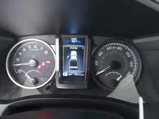 2023 Toyota Tacoma SR z VIN 3TMCZ5AN1PM602567, wystawiony jako IAAI lot #42355648 z przebiegiem 32 472 mil mil oraz . Historia ofert i sprzedaży dostępna na DreamBid. Obrazek 7.