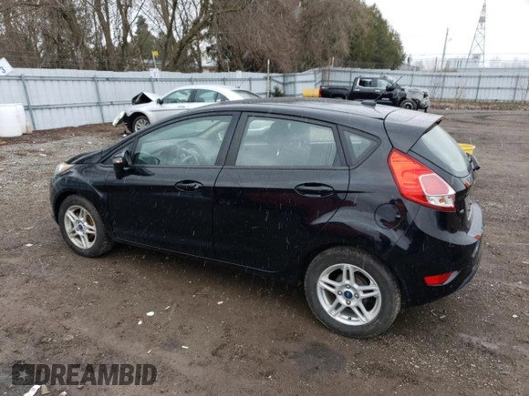 2017 Ford Fiesta SE with VIN 3FADP4EJXHM129934, listed as a Copart auction lot 52249255 with 85,203 mi miles and Salvage Title. Bid and sale history available at carsss.com. Image 2.