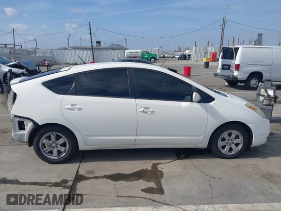 2005 Toyota Prius with VIN JTDKB20U553119699, listed as a IAAI auction lot 42087112 with 212,465 mi miles. Bid and sale history available at carsss.com. Image 14.